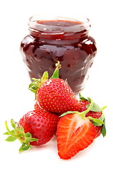 Image showing Strawberry jam and fresh berries.