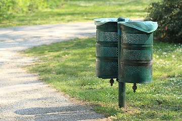 Image showing two iron trash cans