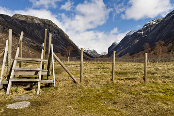 Image showing fence with stairs in rural landscape