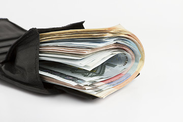 Image showing many banknotes in wallet