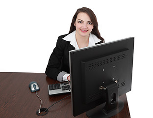 Image showing Young woman working on a computer