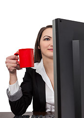 Image showing Businesswoman with a red cup of coffee