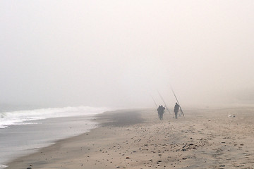 Image showing Anglers on Beach in Fog