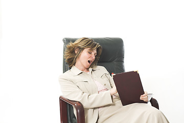 Image showing business woman yawning