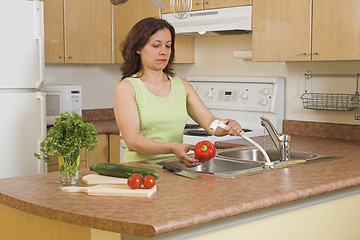Image showing woman using faucet