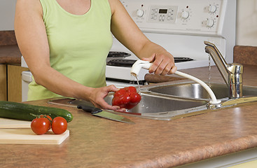 Image showing woman using faucet