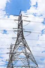 Image showing Transmission tower at blue sky