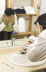 Image showing man drying face with towel