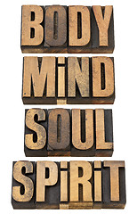 Image showing body, mind, soull and spirit in wood type