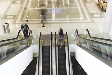 Image showing people taking escalator