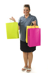 Image showing woman with shopping bags posing
