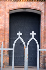 Image showing church steel gate entrance closeup with cross 