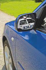 Image showing mirror blue car