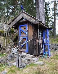 Image showing Outhouse in blue and brown
