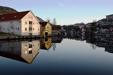 Image showing Houses reflected in water