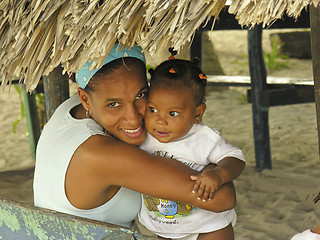 Image showing Woman Embraces her Daughter on a Beach of Santo Domingo