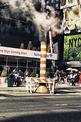 Image showing New York City, NY - March 9: A Manhole throws out Smoke in Centr