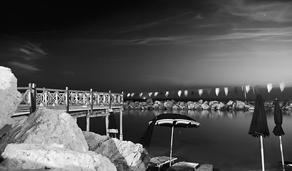 Image showing Beach Umbrellas at Sunset