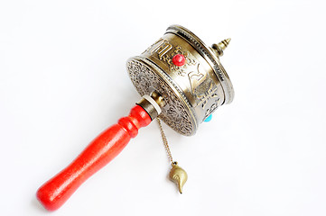 Image showing Tibetan prayer wheel on a white background