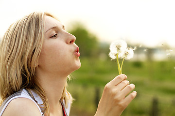 Image showing Woman With Dandelion