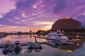 Image showing Yacht pier at sunset time under long exposure in Hong Kong, Gold