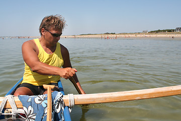 Image showing man in pirogue