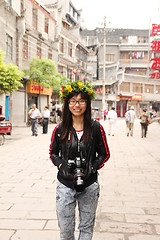 Image showing Asian woman travelling in China with her camera