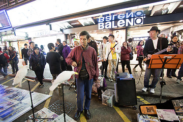 Image showing Performers along the street in Hong Kong at night