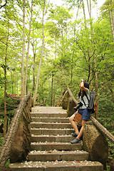 Image showing Asian woman travelling in forest