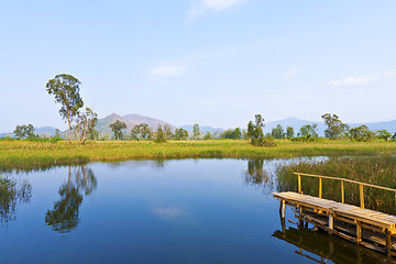 Image showing Wetland lake and wooden pier