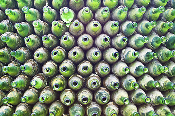 Image showing Green glasses bottles background