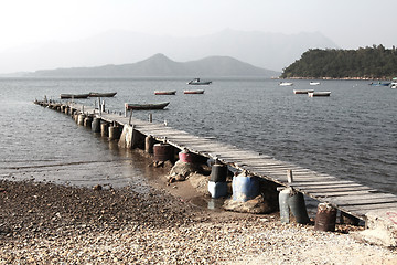 Image showing Wooden pier along the coast