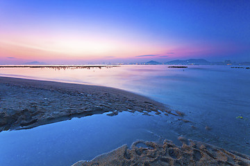 Image showing Sunset in Hong Kong along the coast