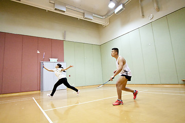 Image showing Asian friends playing badminton