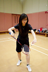 Image showing Asian woman playing badminton