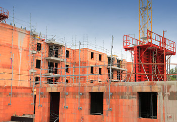 Image showing residential building under construction in red brick