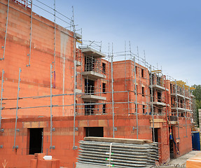 Image showing residential building under construction in red brick