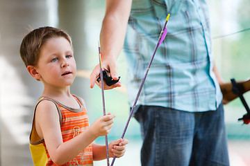 Image showing Boy with archery arrows