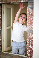 Image showing Boy and window