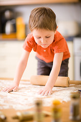 Image showing Boy baking cookies