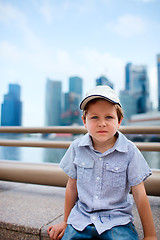 Image showing Cute boy in big modern city