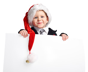 Image showing Little Santa helper with banner.