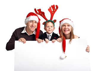 Image showing Christmas family with banner