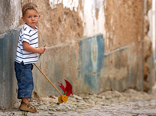 Image showing Little one with handmade toy