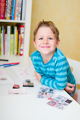 Image showing Schoolboy at home