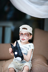 Image showing Boy with face painted