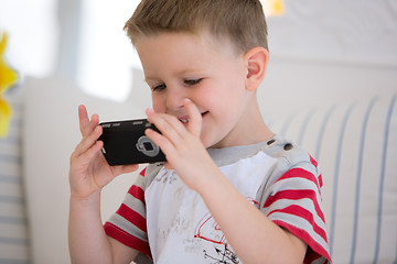 Image showing Boy with camera