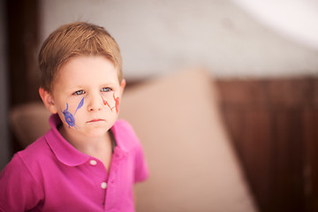 Image showing Boy with face painted