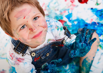 Image showing Boy painting