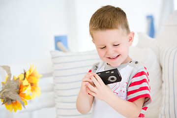 Image showing Boy with camera